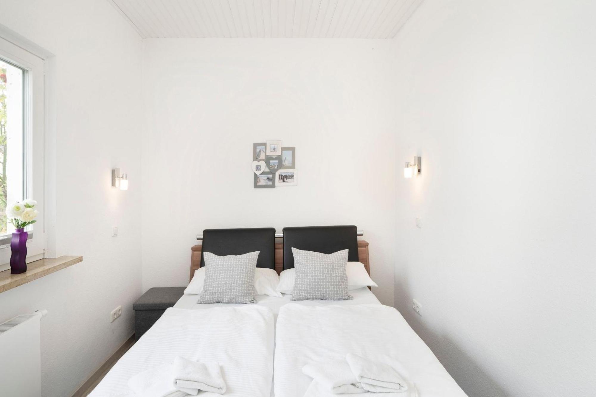 Haus Waldfrieden Ferienhaeuschen Waldfrieden Appartement Haffkrug Buitenkant foto